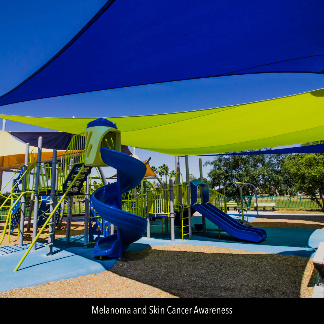 Image of playground under shade covering 