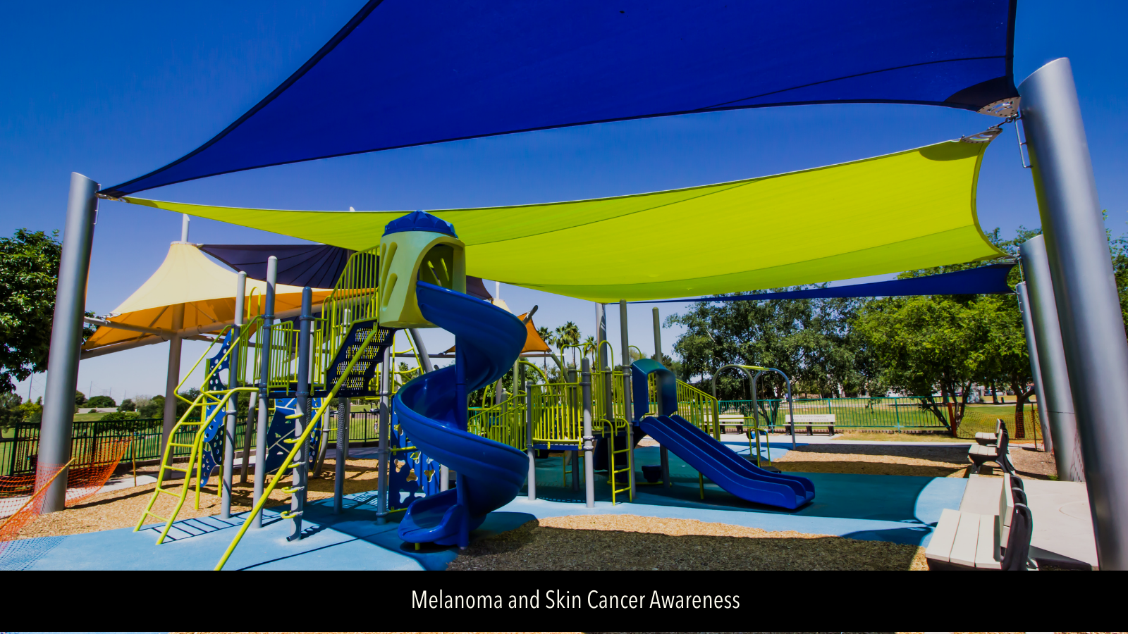 Image of playground under shade covering 